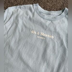 light blue graphic tee